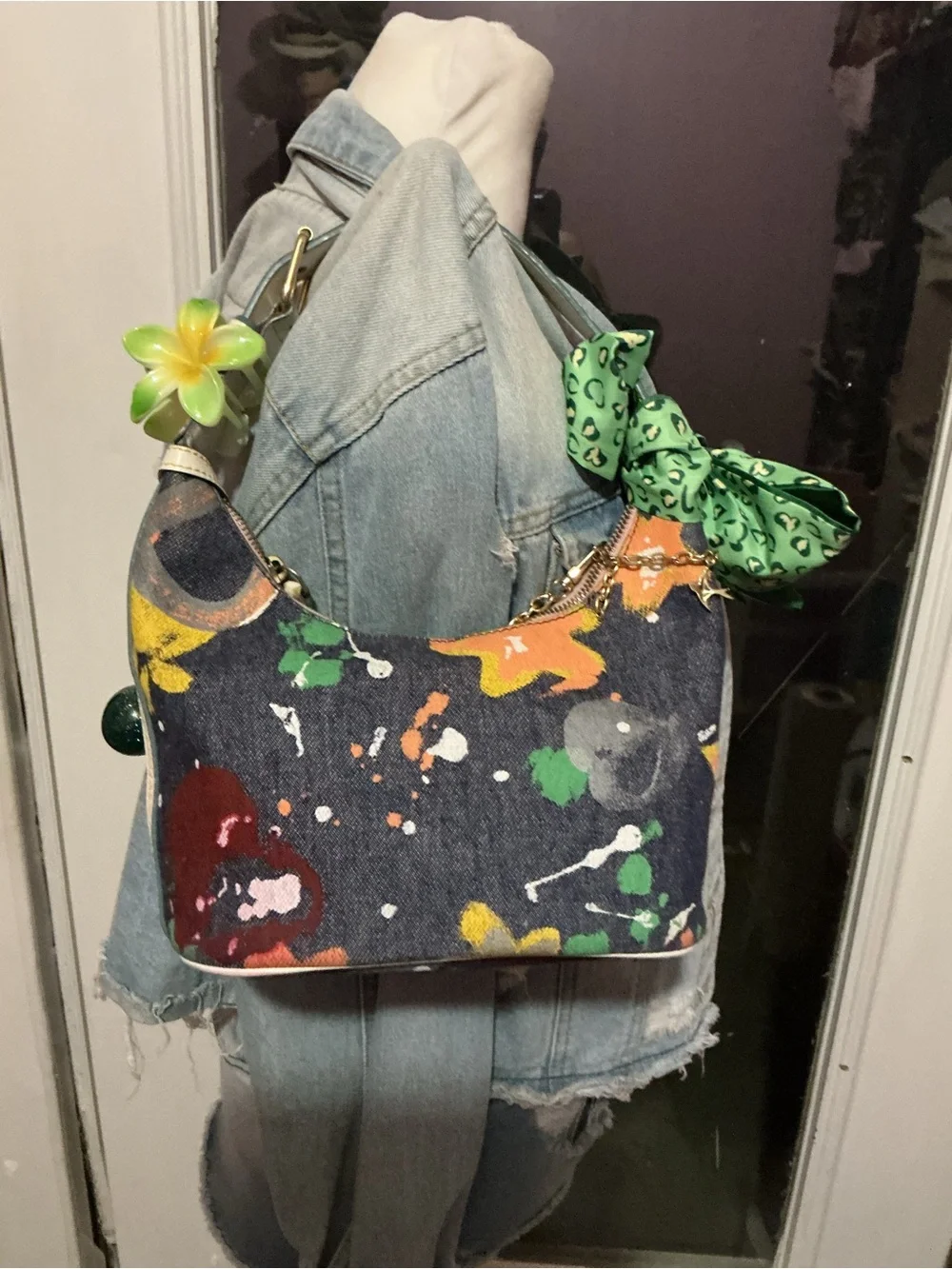 Paint-Splash Denim Shoulder Bag with Floral Charm - Green Accents
